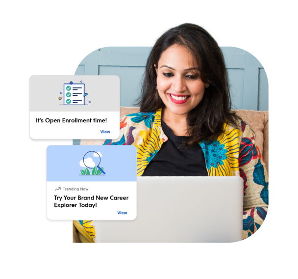 A woman with a smile working on a laptop and a labeled text 